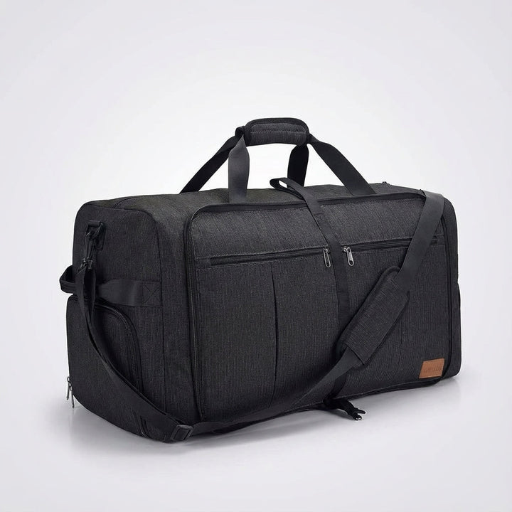 Detail van de waterafstotende stof en stevige ritsen van de FlexiHaul opvouwbare sporttas, duurzaam reisaccessoire.