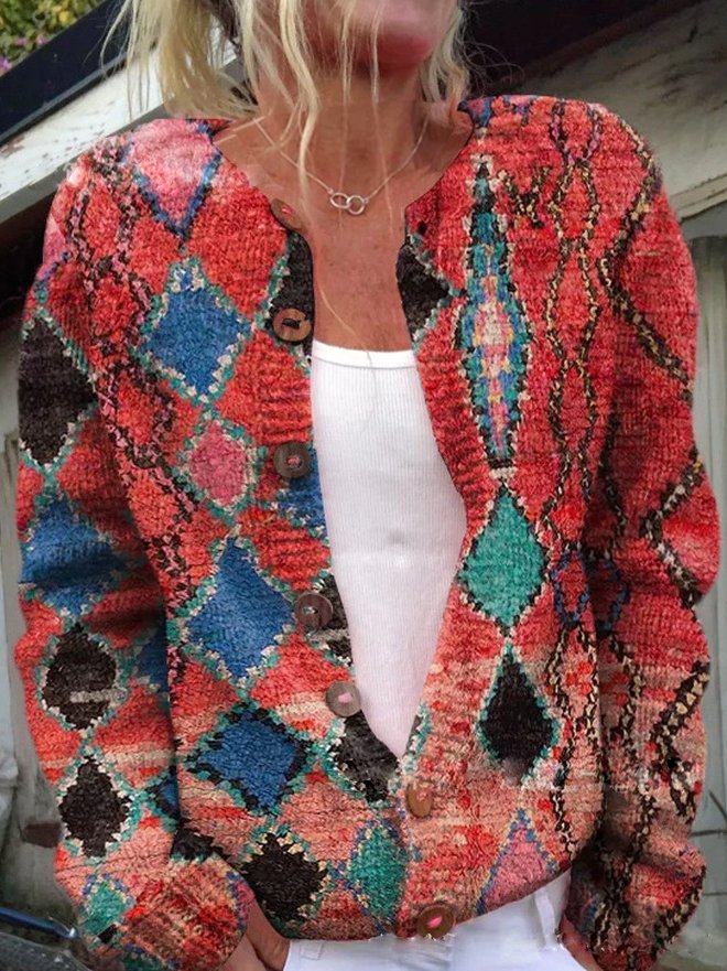 "Gebreide damescardigan, bloemenprint, knoopdetails, warme stijl, verfijnde uitstraling, ideaal voor elke gelegenheid."