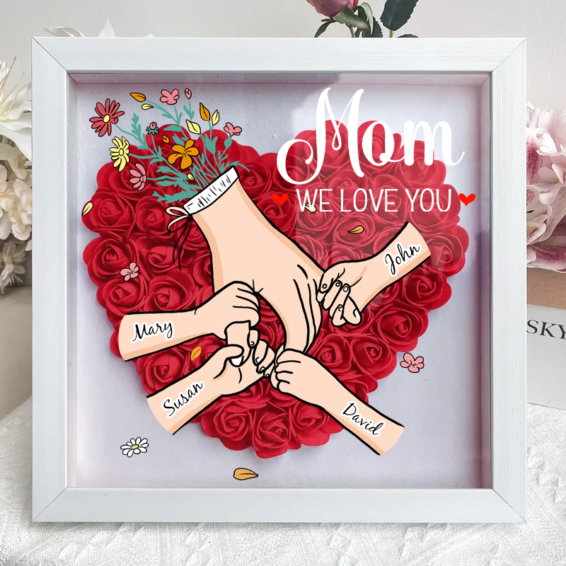 Sfeervol bloemenlijstje met familienamen en LED, perfect als interieurdecoratie of gepersonaliseerd geschenk.