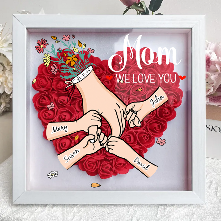 Sfeervol bloemenlijstje met familienamen en LED, perfect als interieurdecoratie of gepersonaliseerd geschenk.