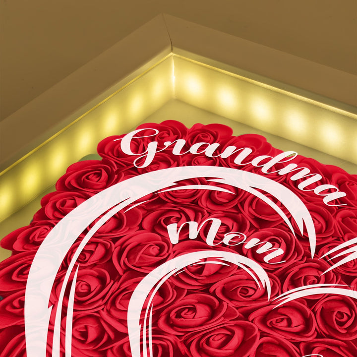 Hartvormige schaduwbox met gepersonaliseerde bloemen en LED, perfect familie herinnering geschenk.