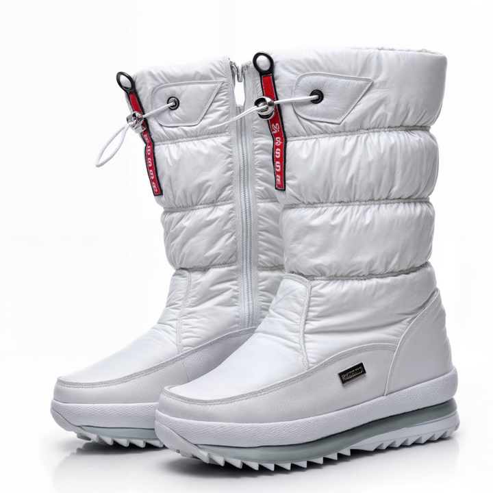 Duurzame gevoerde dames winterboots, middenhoog model voor optimale warmte. Stijlvolle en comfortabele sneeuwschoenen.