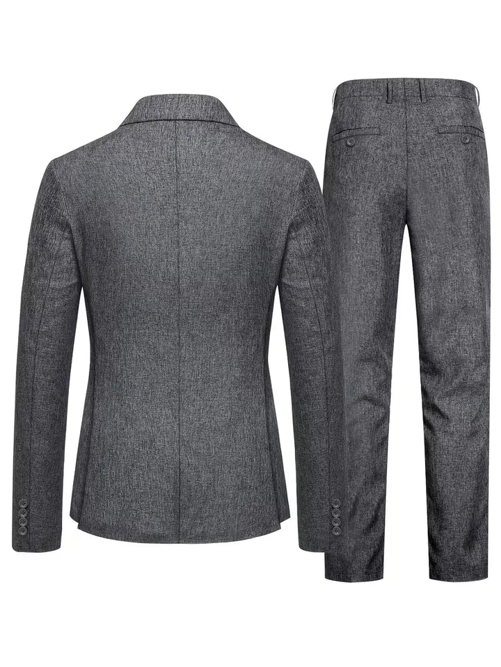 Elegant grijs herenpak met een slim fit pasvorm, geschikt voor zakelijke meetings, bruiloften en gala's.