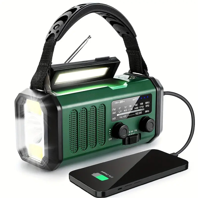 Grijze noodradio met zonnepaneel, handgreep en digitale display. Ideaal voor kamperen met 10.000mAh batterij.