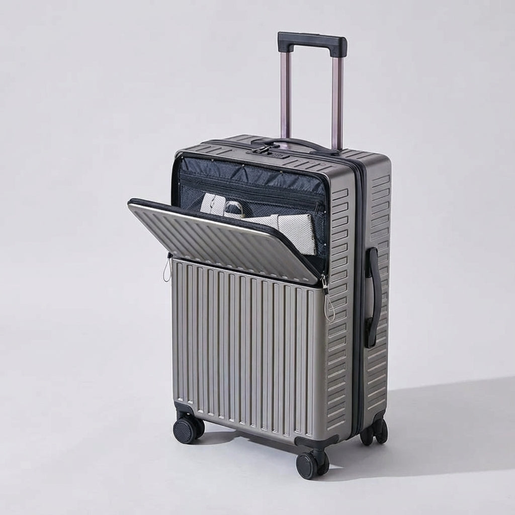 Travelift spinner koffer met ruim voorvak voor laptop/documenten, handig voor snelle toegang tijdens zakenreizen.