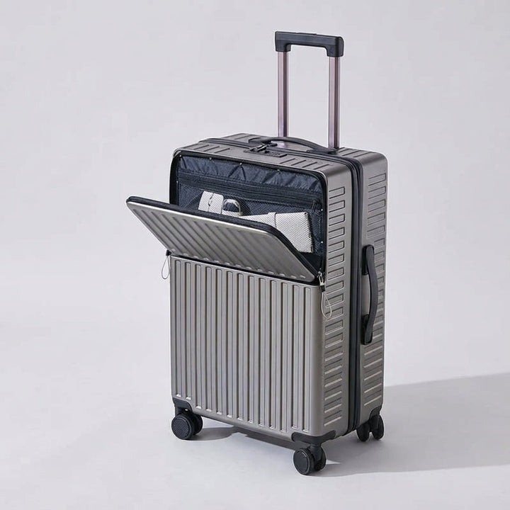 Travelift spinner koffer met ruim voorvak voor laptop/documenten, handig voor snelle toegang tijdens zakenreizen.