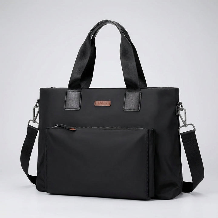 Zwarte MetroBrief canvas laptoptas, veelzijdig en robuust voor dagelijks gebruik en zakelijke reizen.