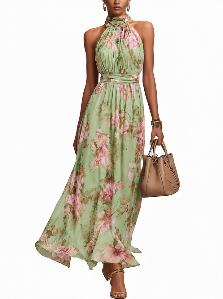 Groene dames maxi jurk met halternek en vrolijke bloemenprint, perfect voor zomerse dagen of als elegante feestjurk.