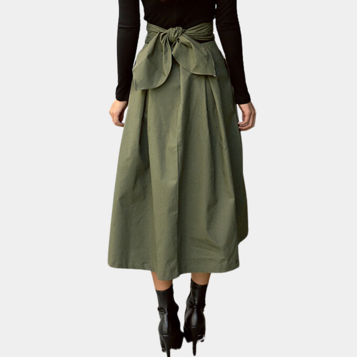 Comfortabele bruine damesrok met hoge taille, veelzijdig voor zowel zakelijk als casual gebruik. Trendy vrouwenmode.