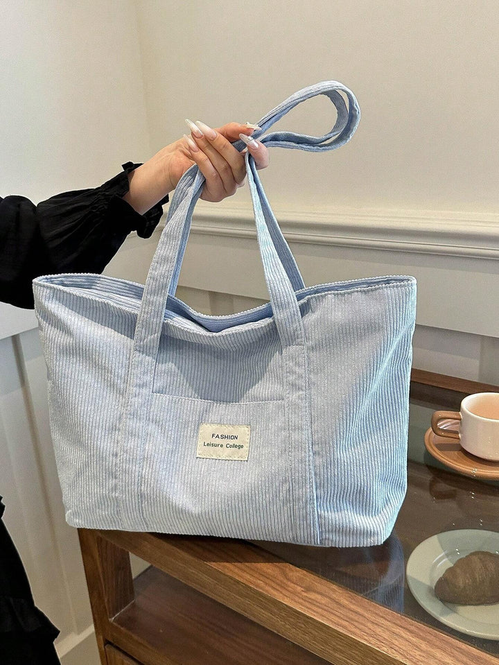 Functionele grote corduroy tas, ideaal als studententas of werktas.