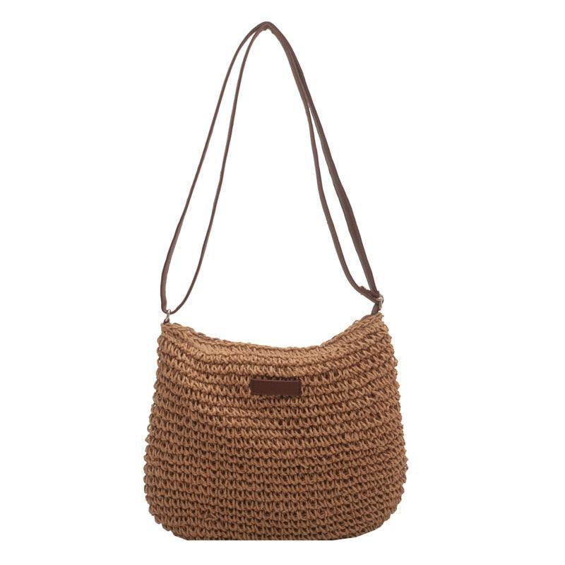 "Handgemaakte boho handtas voor dames, zomerse strandtas met natuurlijke charme en ruim design, ideaal voor zonnige dagen."