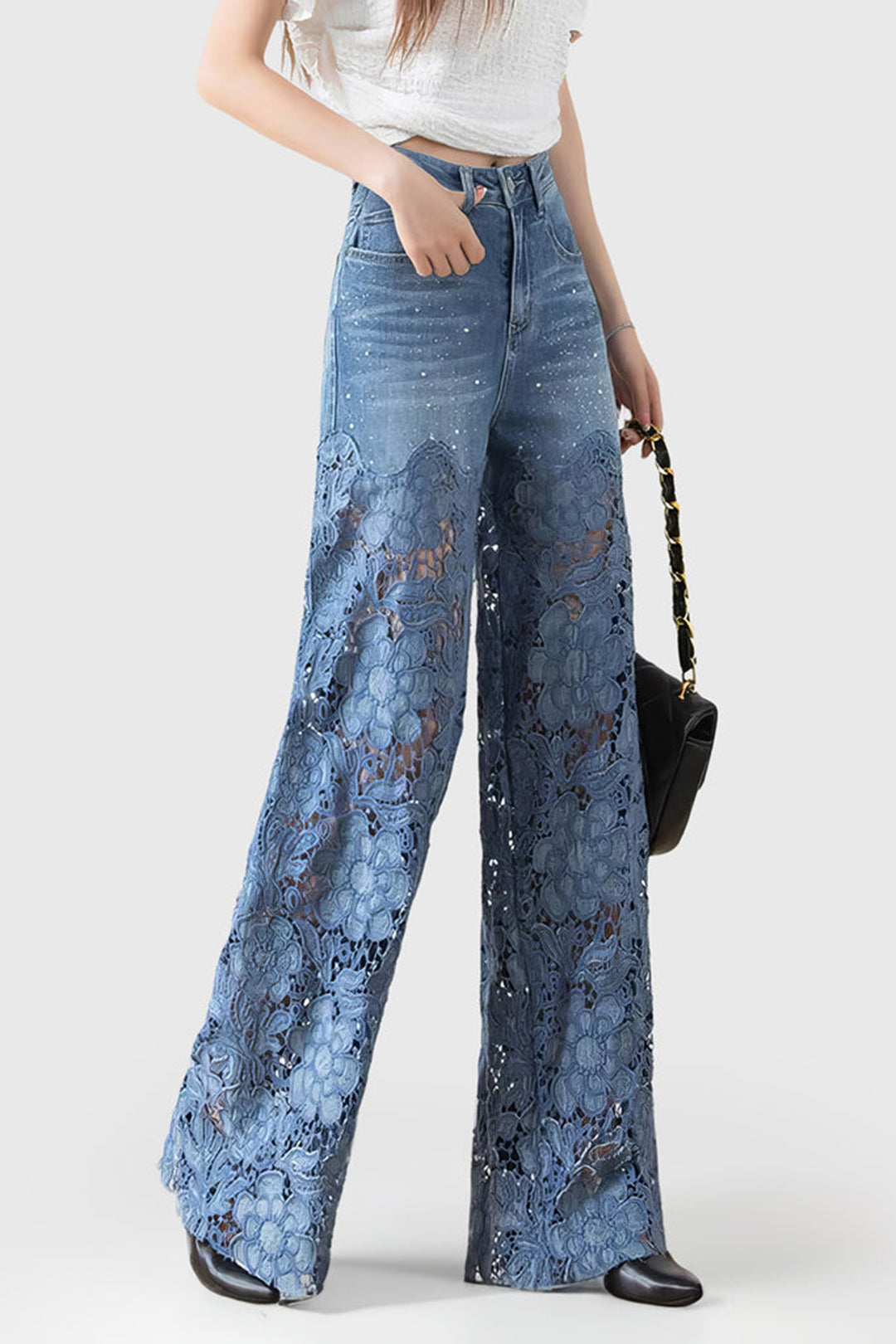 Hemelsblauwe dames patchwork jeans met wijde pijpen en elegante kanten details voor een stijlvolle, comfortabele look.