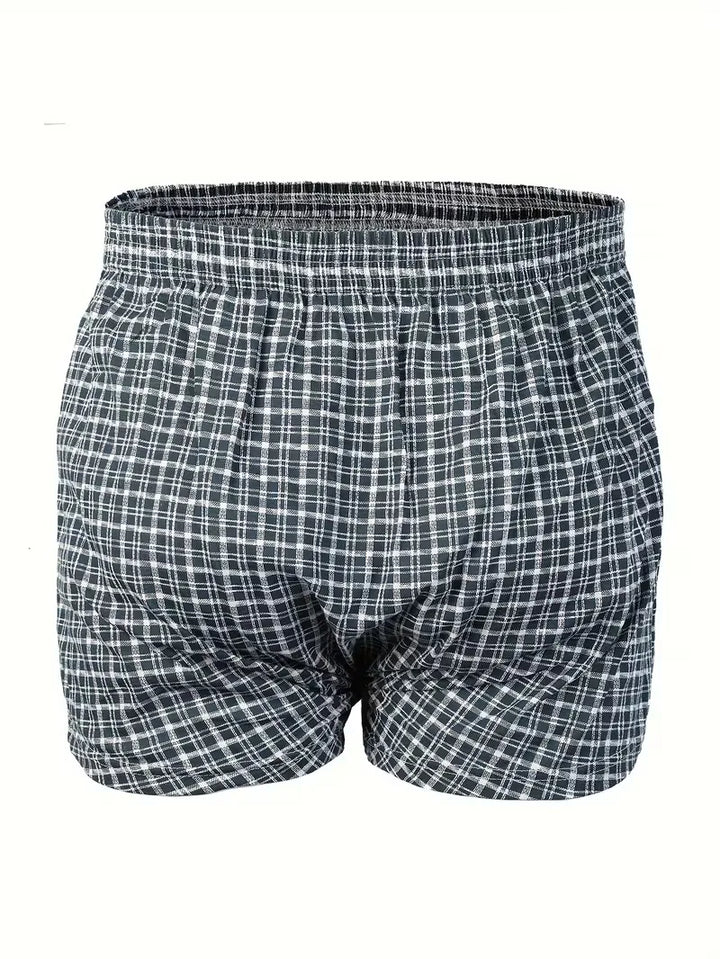 Petrol heren boxershort, liggend. Benadrukt de flexibele pasvorm en het comfortabele design.