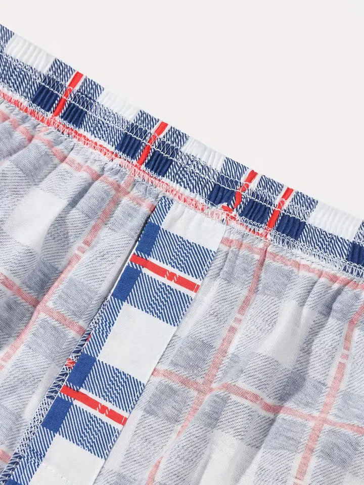 Textuurdetail van de zachte stof van de heren boxershort, benadrukt comfort en duurzaamheid.
