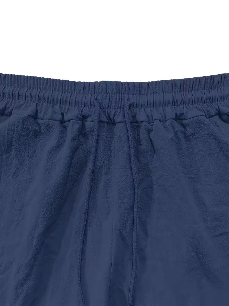 Veelzijdige heren casual zomer set: korte mouw overhemd met V-hals en bijpassende broek.