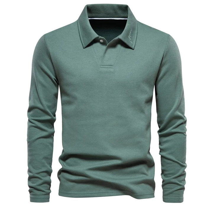 Grijs heren poloshirt met lange mouwen, een veelzijdige en comfortabele toevoeging aan herenmode.