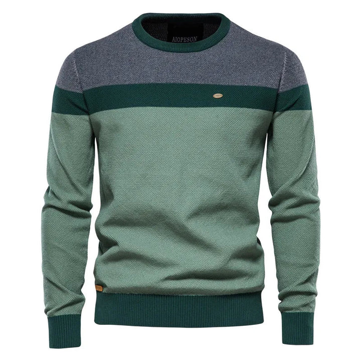 Casual herentrui met opvallende kleurblokken en comfortabele ronde hals, ideaal voor herfst mode.