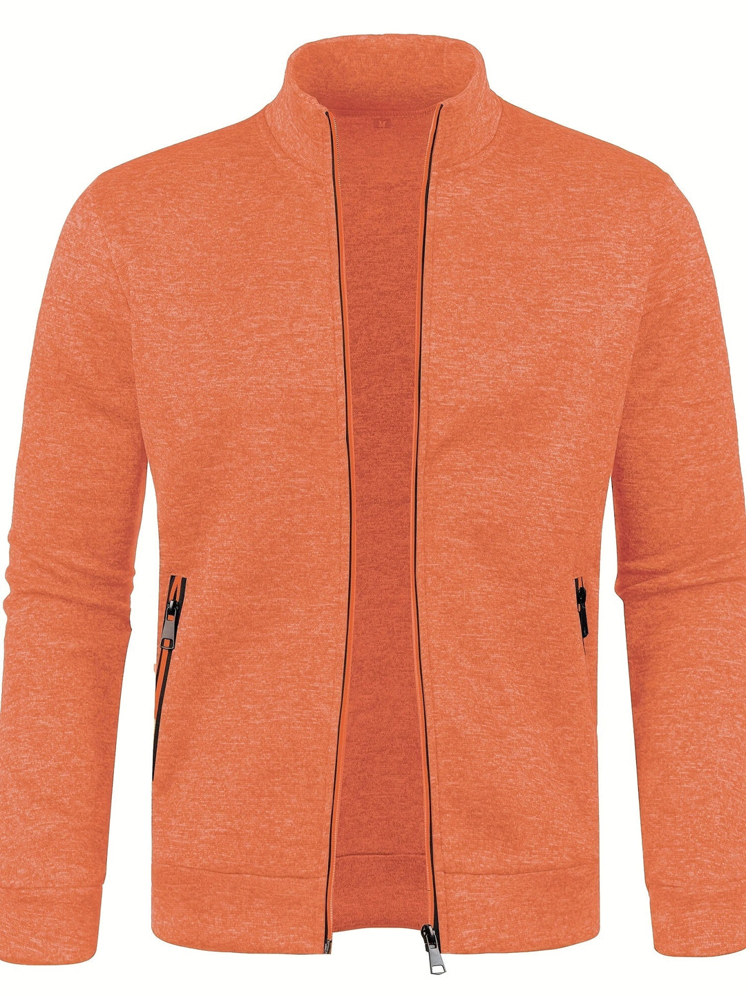 Stapel handgemaakte herenvesten, symbool van luxe en comfortabele mode