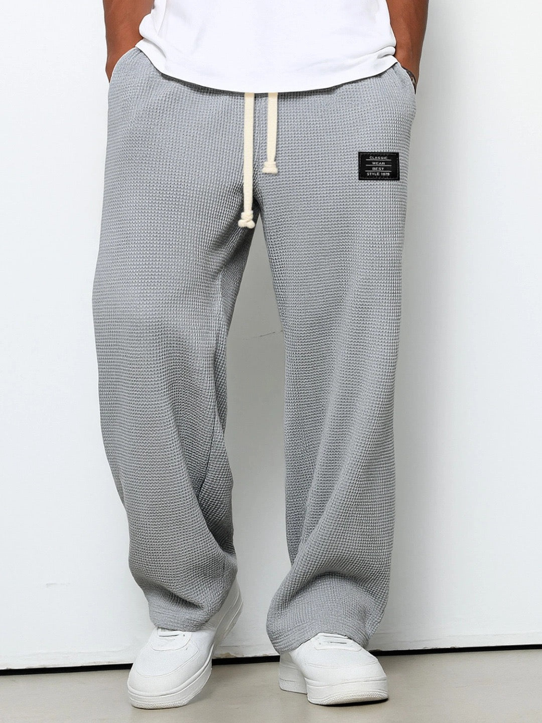 Luchtige zomerse heren relaxbroek met losse pasvorm en verstelbare tailleband voor comfort.