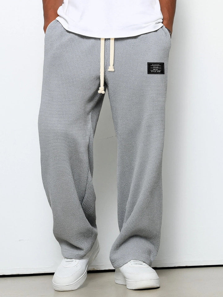 Luchtige zomerse heren relaxbroek met losse pasvorm en verstelbare tailleband voor comfort.