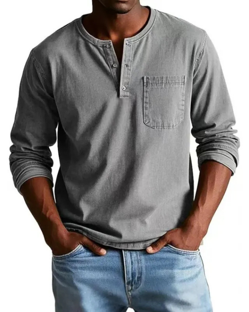 Dit heren denim shirt biedt ultiem comfort en een modieuze uitstraling, met henley en borstzak.