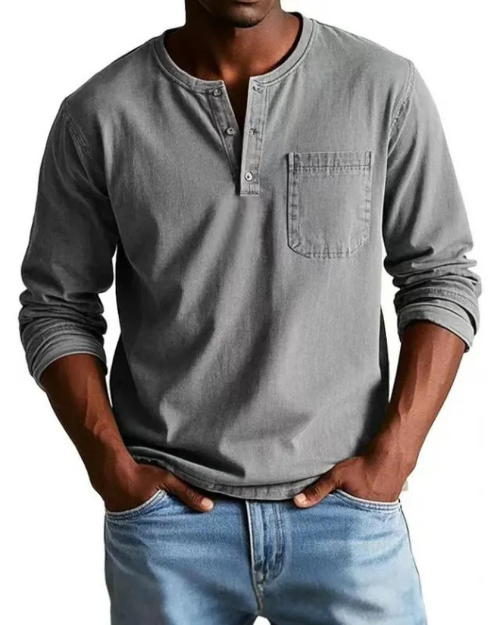 Dit heren denim shirt biedt ultiem comfort en een modieuze uitstraling, met henley en borstzak.