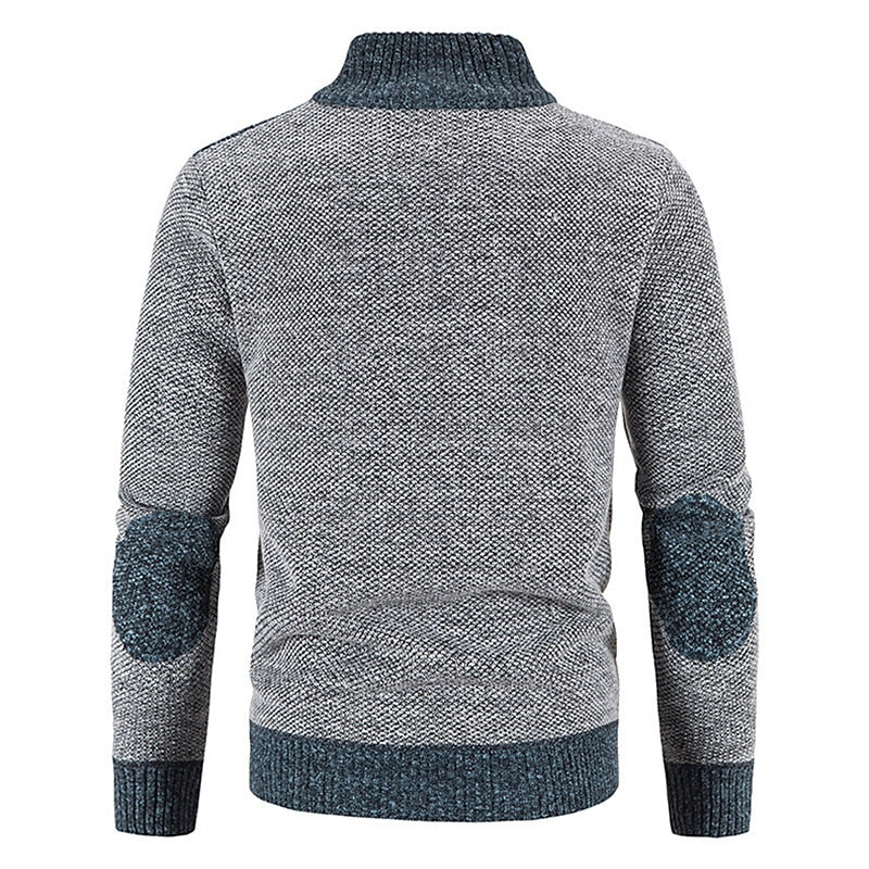 Comfortabel gebreid herenvest met rits en patchwork; warm en modieus voor koude dagen.