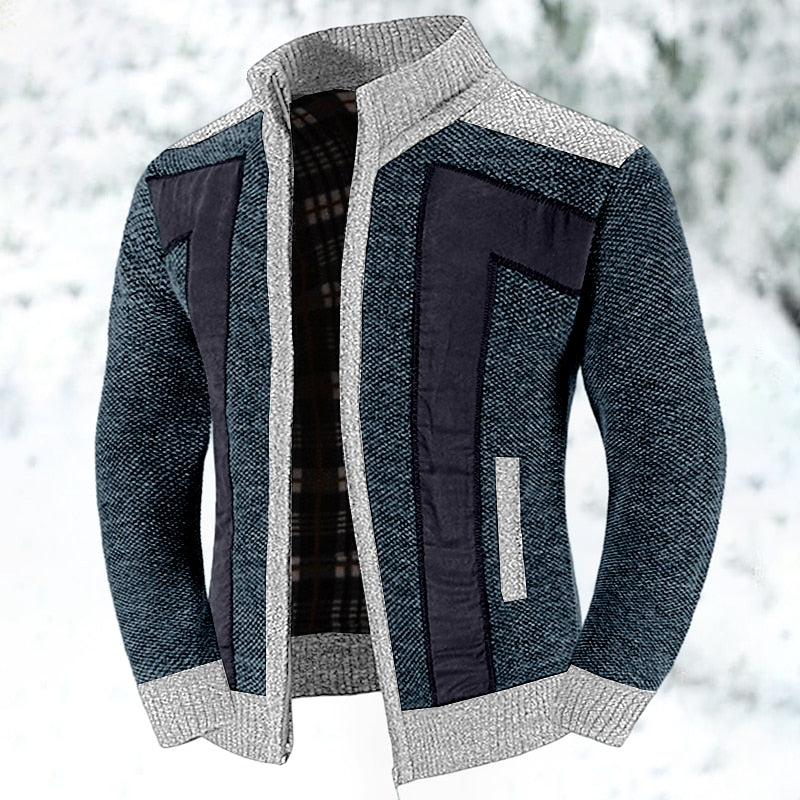 Warm en stijlvol heren ritsvest, gebreid met patchwork details. Comfortabel voor dagelijks gebruik.