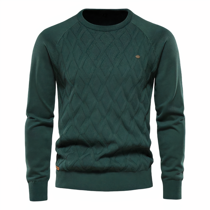 Stijlvolle heren wintertrui, gebreid met kenmerkend diamantpatroon. Slanke pasvorm voor een moderne look.