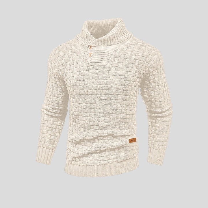 Elegante herenkleding: gebreide trui met subtiele knoopaccenten, ideaal voor een stijlvolle en warme winterlook.