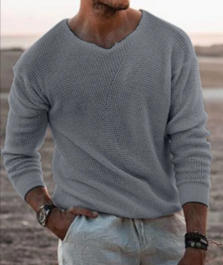 Mannen trui gebreid, zacht en warm, met elegante V-hals en modern textuurpatroon, veelzijdig en comfortabel.