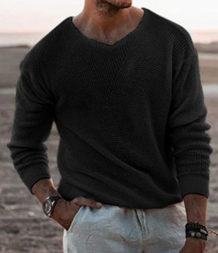 Trendy heren V-hals trui, fijn gebreid met subtiel textuurpatroon, voor een stijlvolle en comfortabele look.