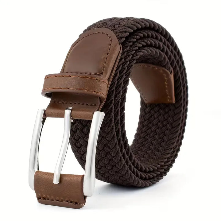 Textuurrijke gevlochten herenriem; comfortabel nylon/leer design met stevige zinklegering gesp. Perfect accessoire.