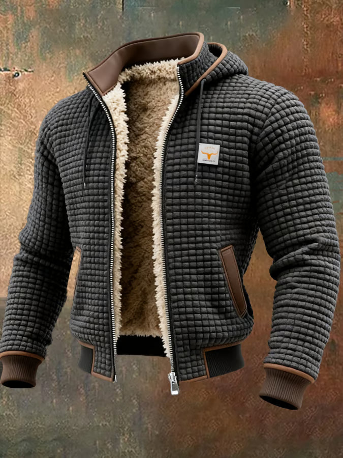 Stijlvol gevoerd herenjack met capuchon, ritssluiting en trendy wafeltextuur. Perfect voor herfst en winter.