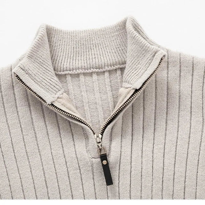 Stijlvolle herensweater met half-zip sluiting, ribgebreid design. Perfecte wintermode.