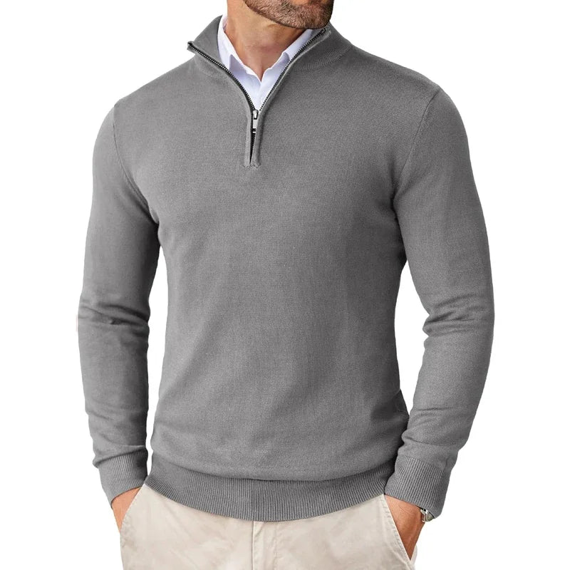 "Heren half-zip trui, zacht en warm, ademend materiaal in neutrale tint, ideaal voor casual of actieve gelegenheden."