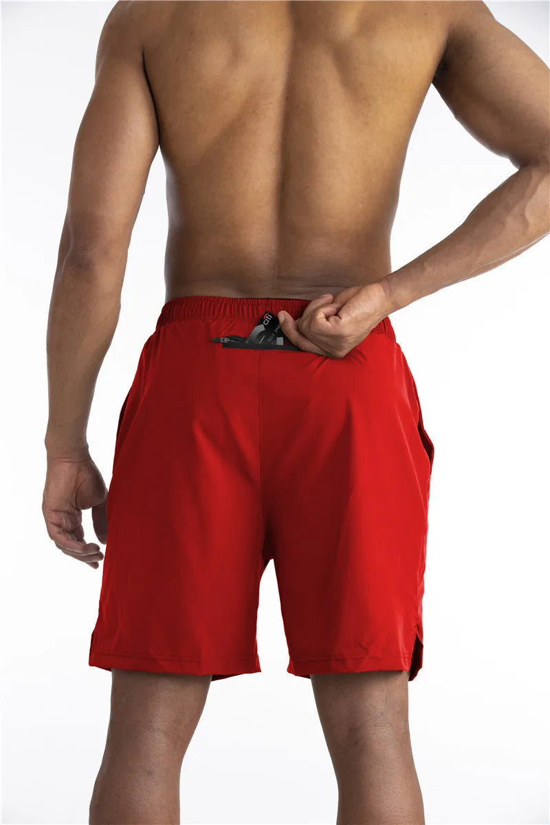 Comfortabele heren sportshorts met geïntegreerde telefoonzak; ideaal voor hardlopen en fitness.