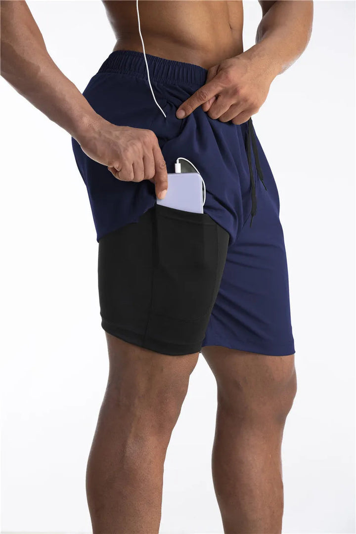 Veelzijdige heren trainingsshorts met liner en veilige telefoonzak, geschikt voor diverse fitnessactiviteiten.