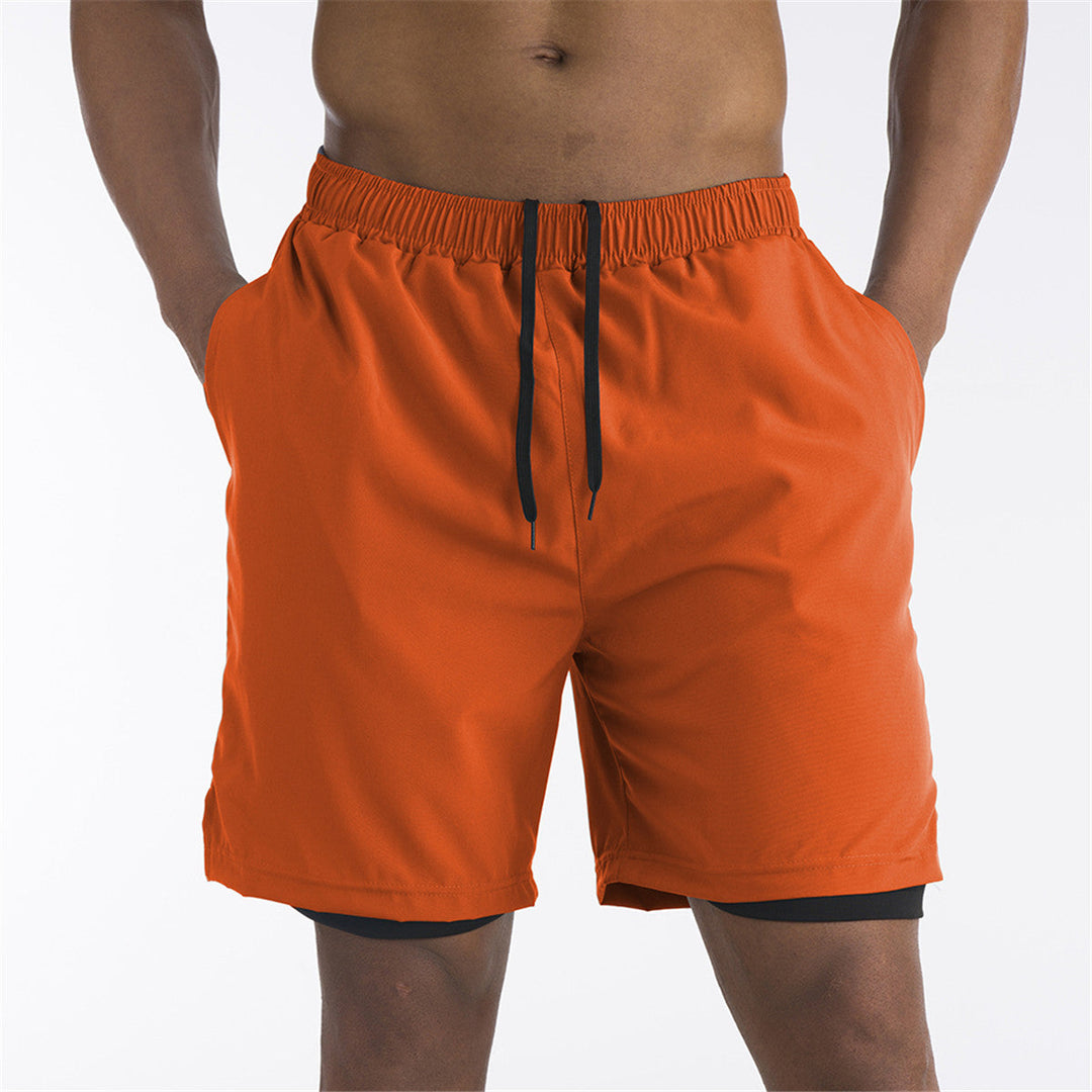 Ondersteunende heren sportshorts met ingebouwde binnenbroek en praktische telefoonzak voor ononderbroken workouts.