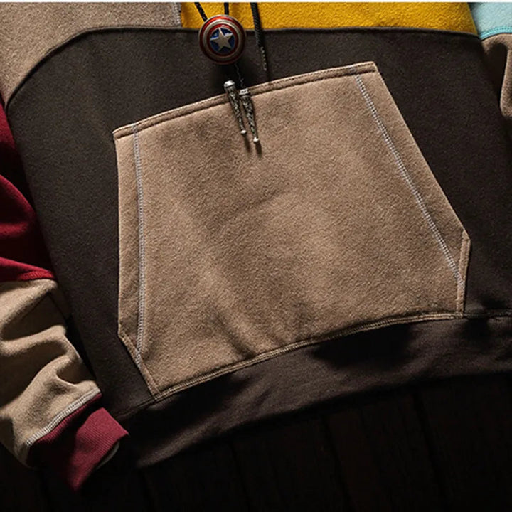 Loose-fit heren hoodie met capuchon, essentieel voor comfort en stijl in de winter of koele herfst.