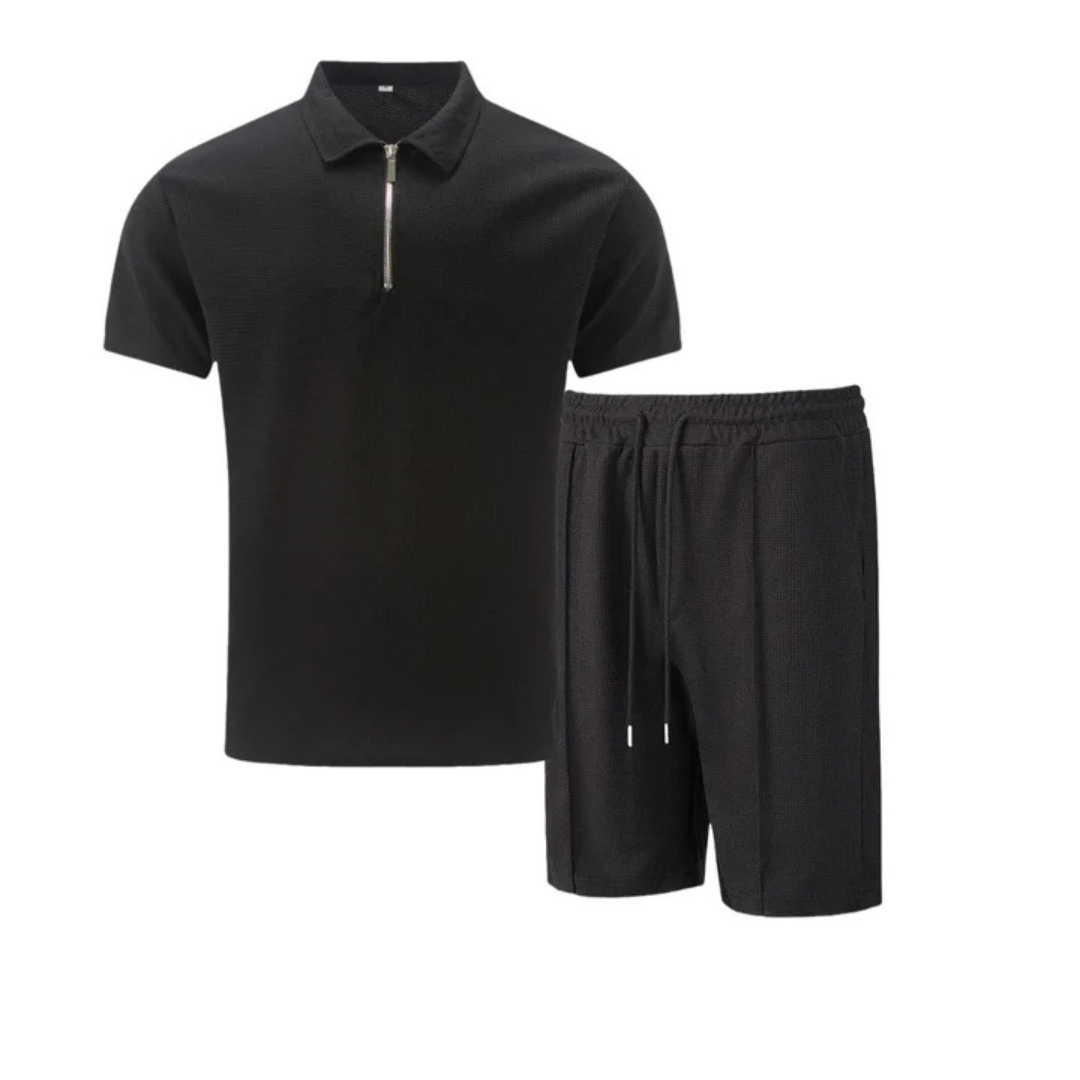 Zomerse heren polo en bijpassende korte broek in een comfortabele co-ord set. Stijlvolle herenmode.