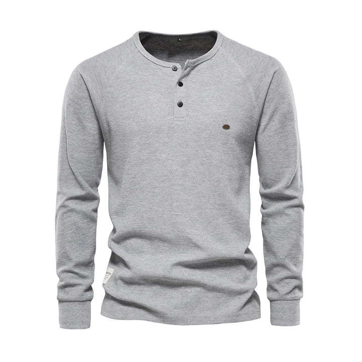 Stijlvol heren langemouwenshirt met ronde hals. Essentieel bovenstuk voor comfortabele en modieuze looks.