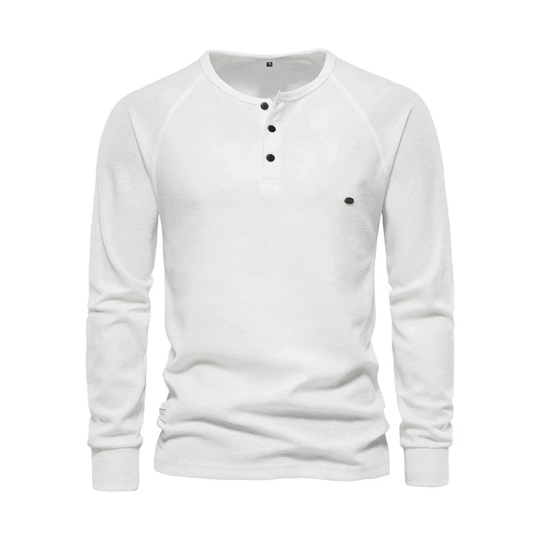 Casual heren langemouwenshirt. Ronde hals, lange mouwen; biedt comfort en stijl voor diverse gelegenheden.