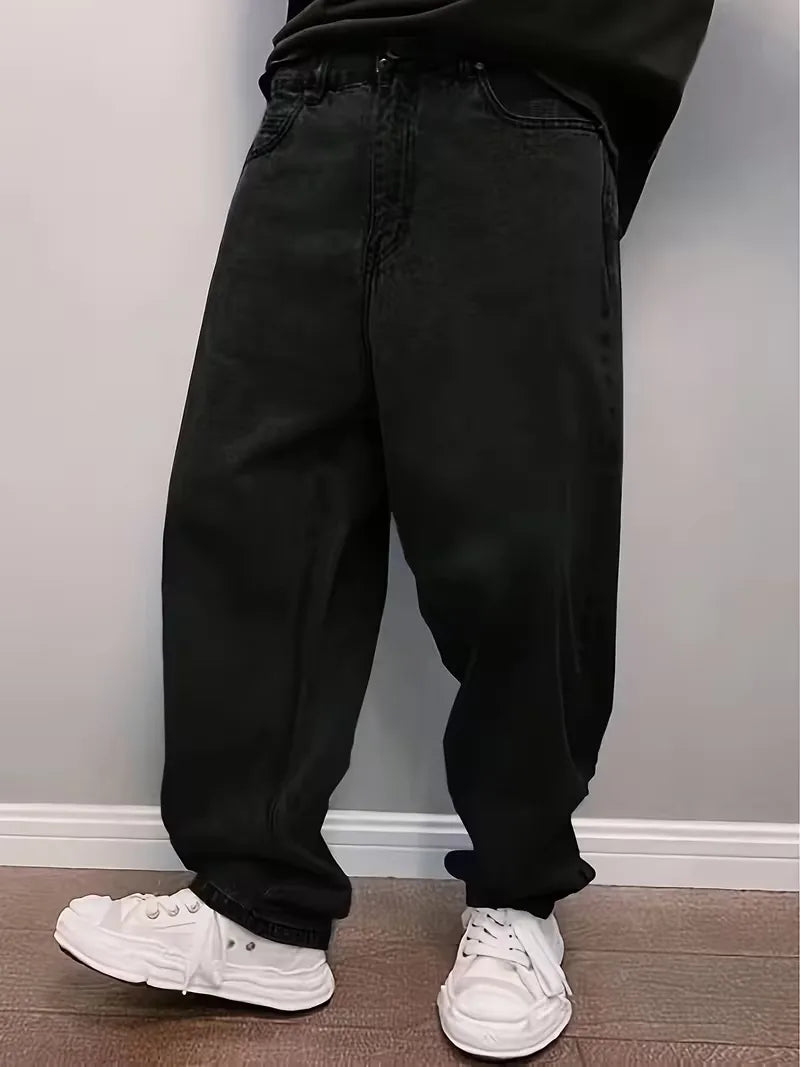 Stijlvolle zwarte heren loose fit jeans, mid-rise pasvorm, wijde pijp, comfortabel voor een moderne look.