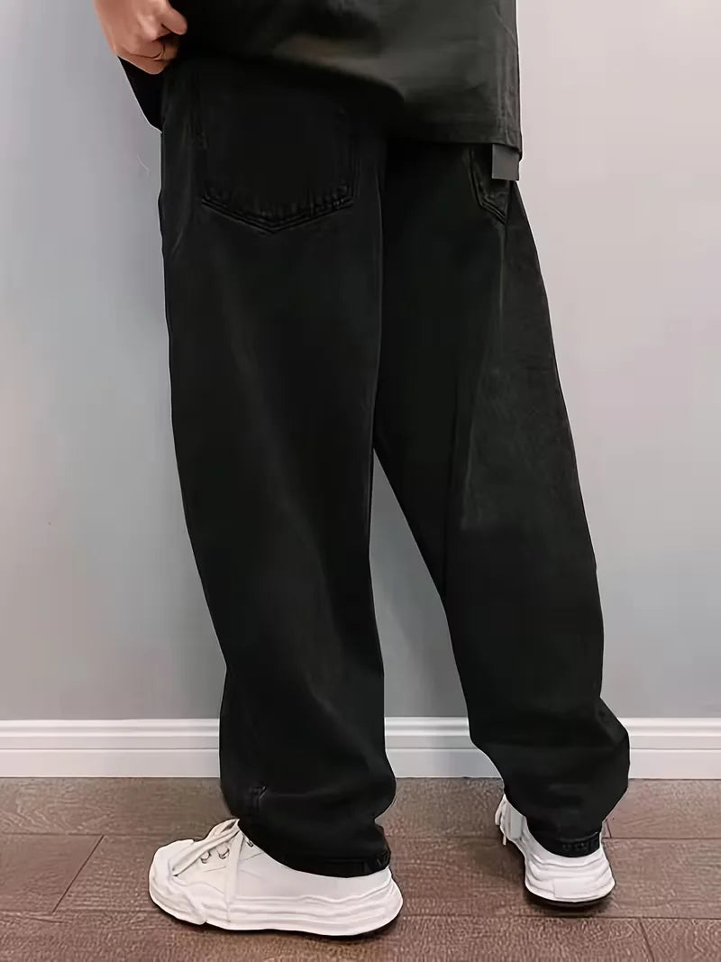 Heren jeans loose fit, mid-rise en comfortabel, een veelzijdige spijkerbroek voor casual en streetwear.