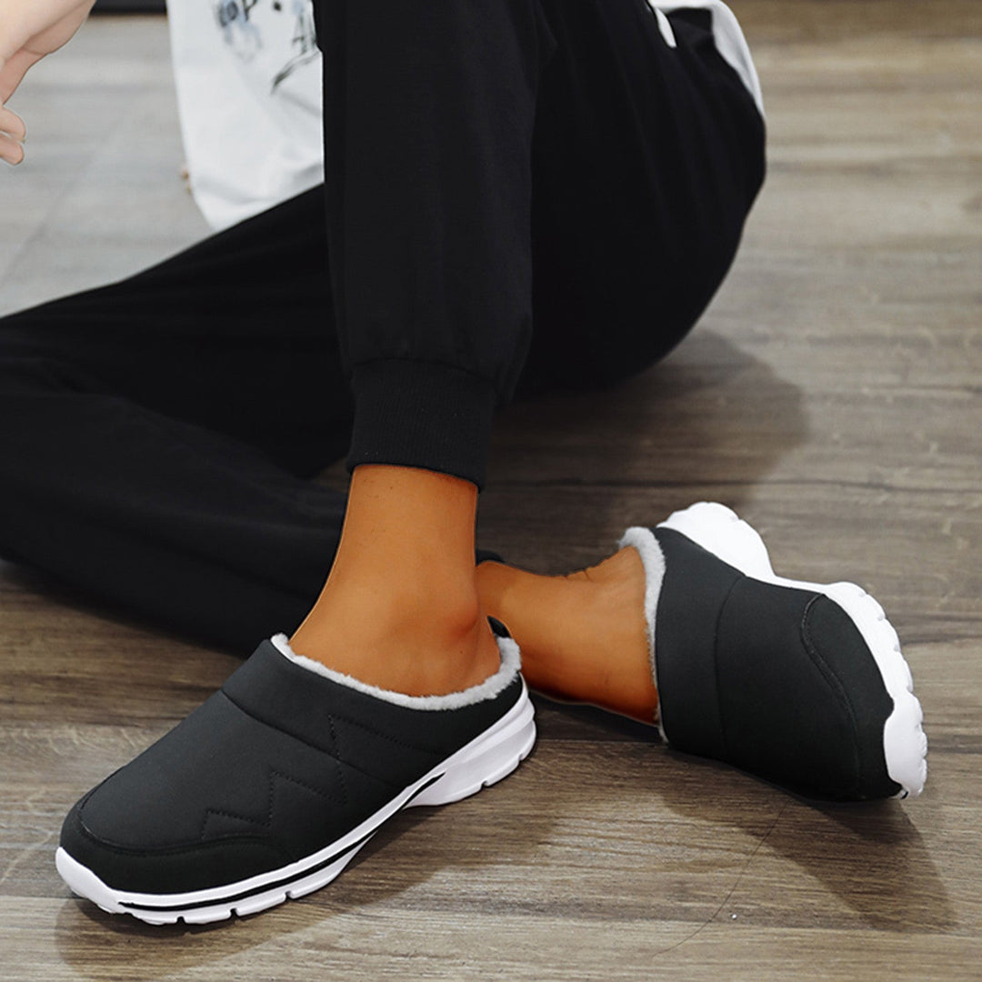 Comfortabele herenpantoffels met orthopedische eigenschappen, geschikt voor thuis in de winter.