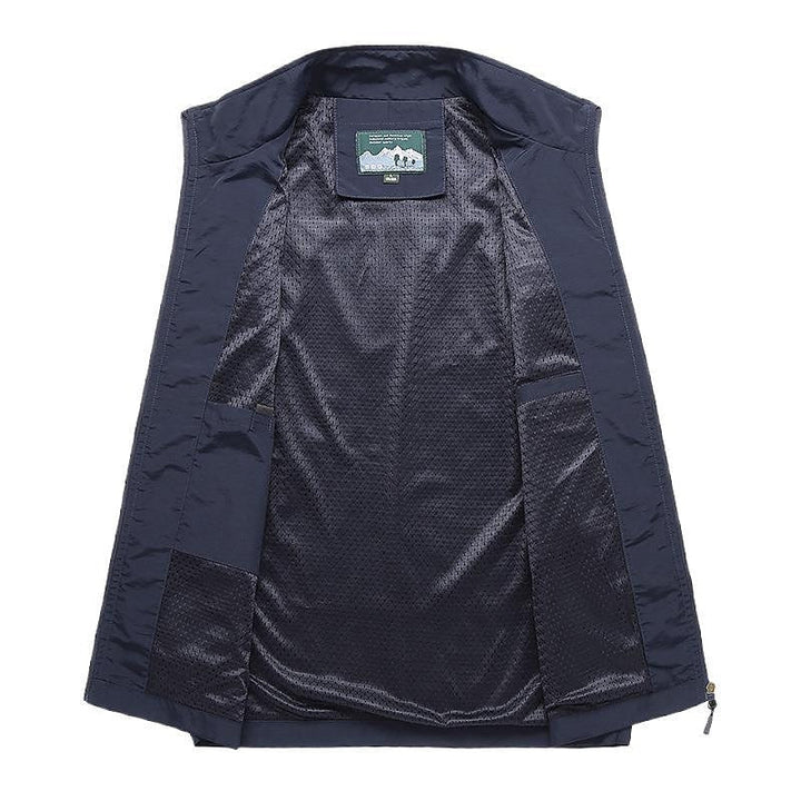 Praktisch heren vest met ruime zakken, ideaal voor vissen en andere outdoor hobby's, comfortabel model.
