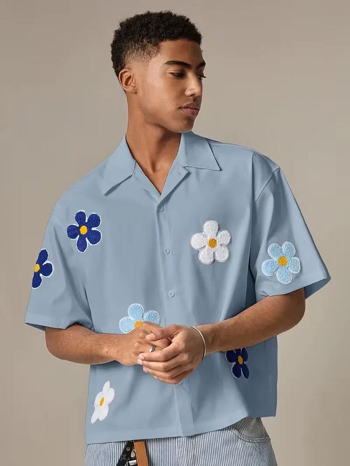 Herenoverhemd met korte mouwen en een expressieve bloemenprint, voor casual dagen.