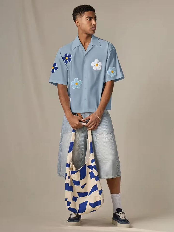 Casual herenoverhemd, korte mouw, met bloemenprint, perfect voor een dagje aan het strand.