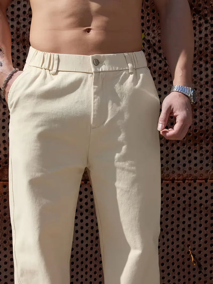 Ademende heren pantalon, geschikt voor lente/zomer, comfortabele pasvorm met elastische band.